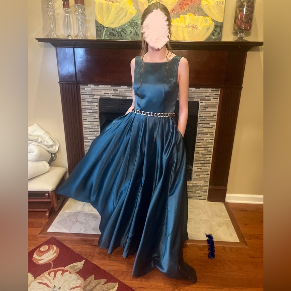 Custom made Peacock Blue formal gown with lace up back. Size 8.